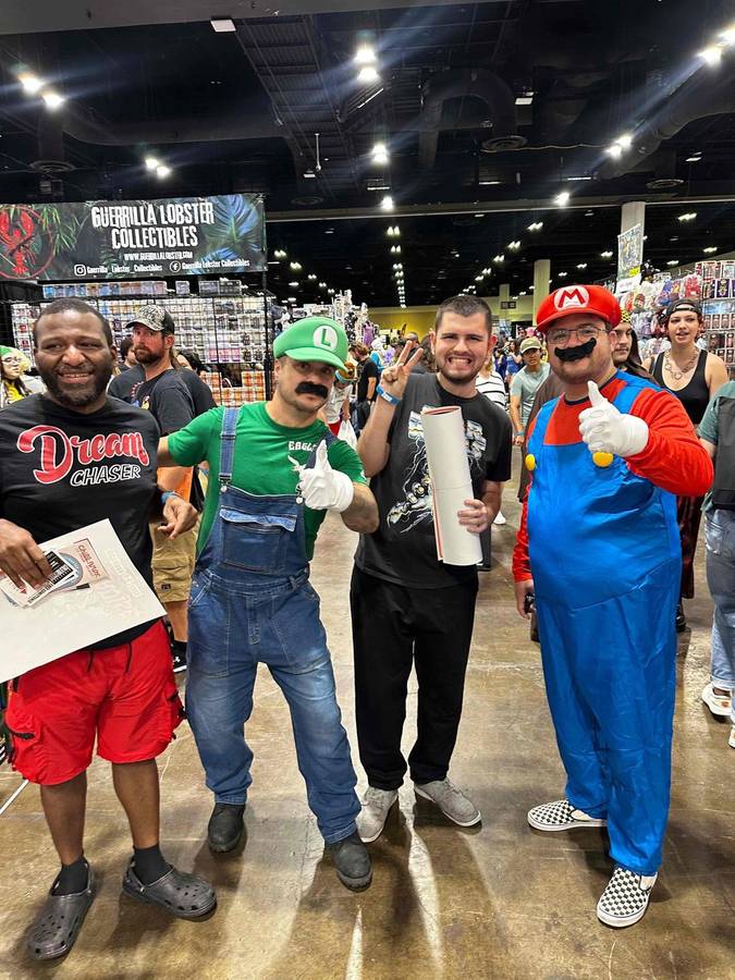 Participants dressed as Mario and Luigi at a comic convention