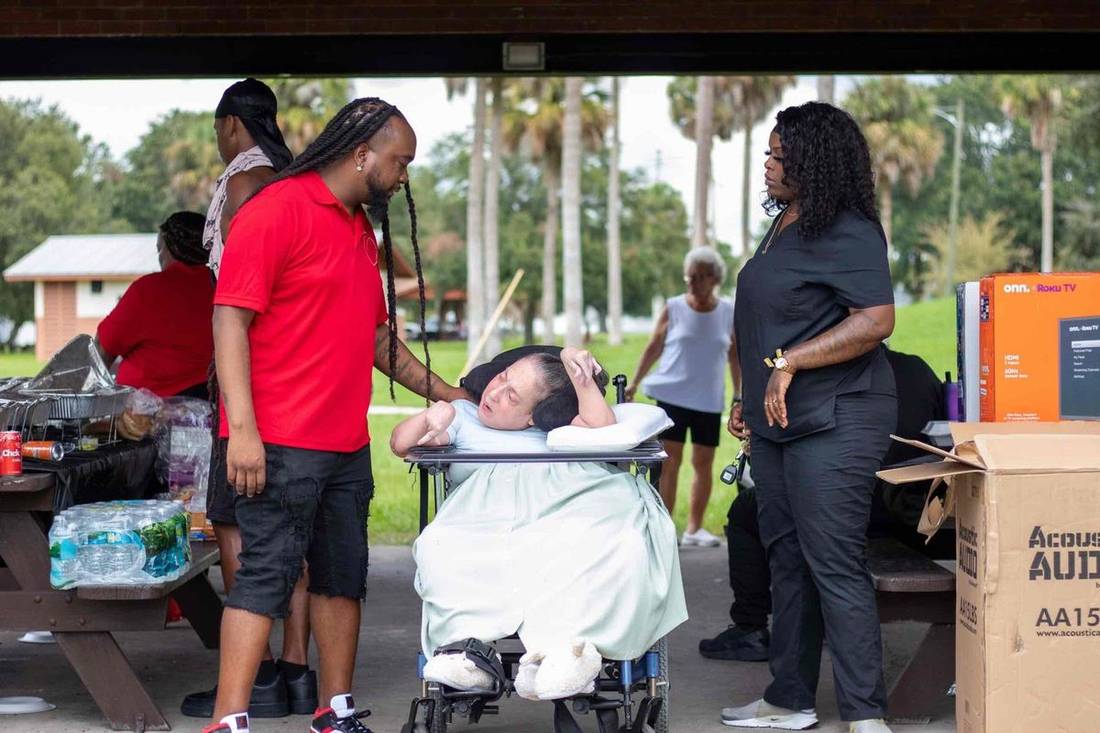 Staff and participants enjoying a day at the park